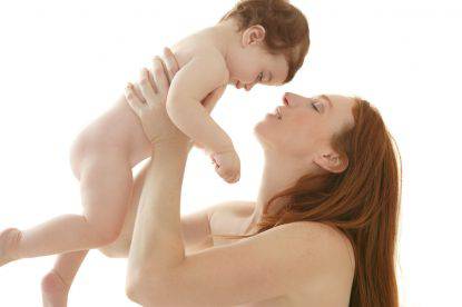 nude baby and mother portrait hug playing