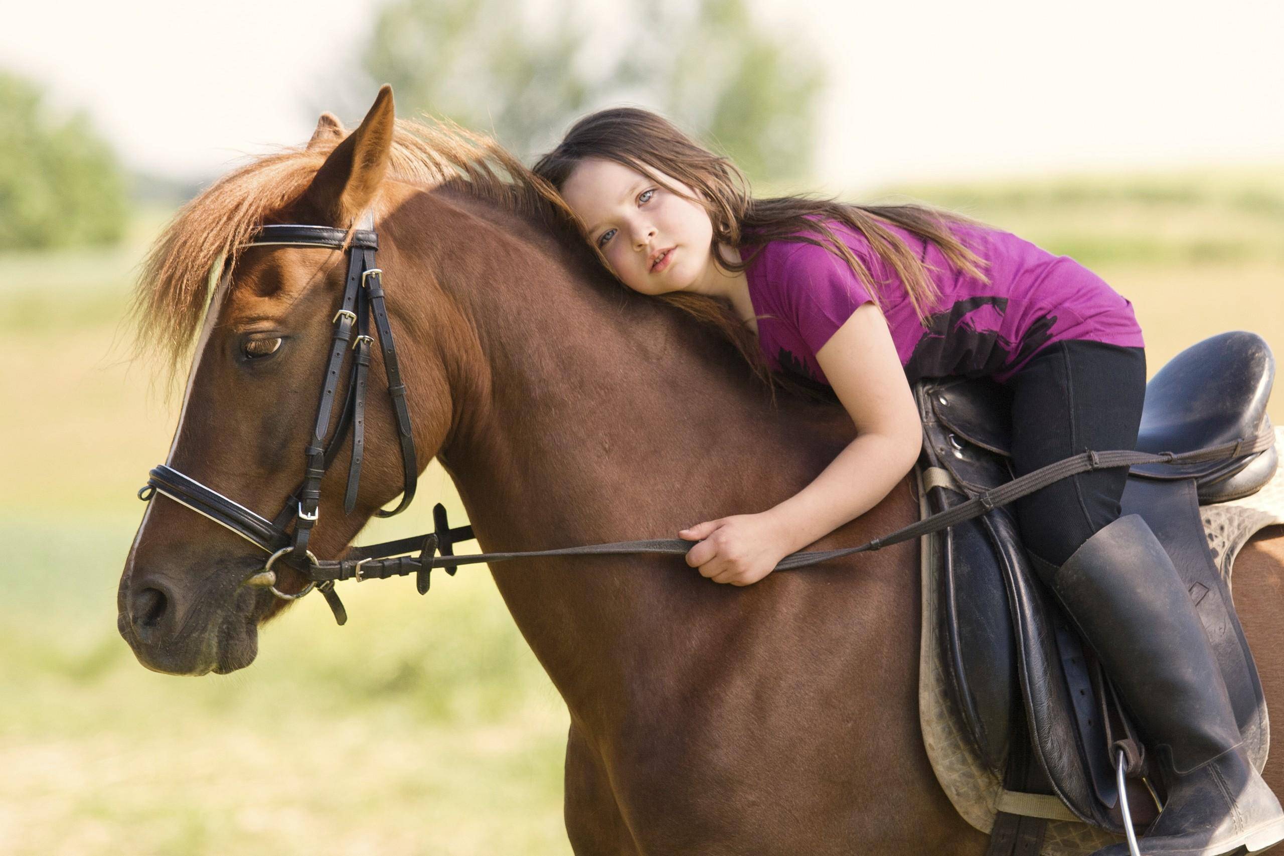 bambina a cavallo