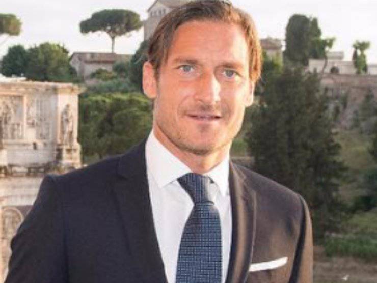 Totti Natale Noemi lusso
